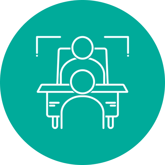 Icon of two stick figures engaging in conversation across a desk, set on a teal circular background.
