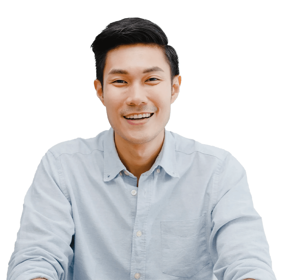 A man in blue shirt smiling for the camera.