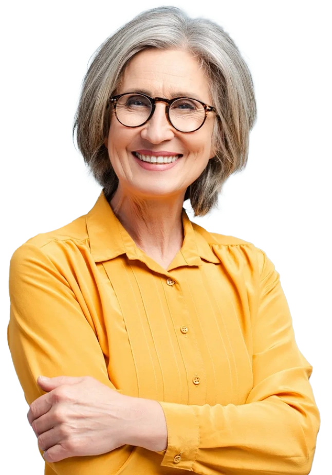 A woman with grey hair wearing glasses and an orange shirt.
