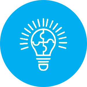 A light bulb with a puzzle piece inside of it.