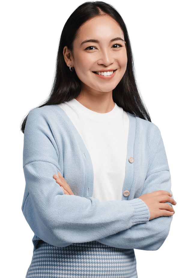 A woman with her arms crossed wearing a sweater.
