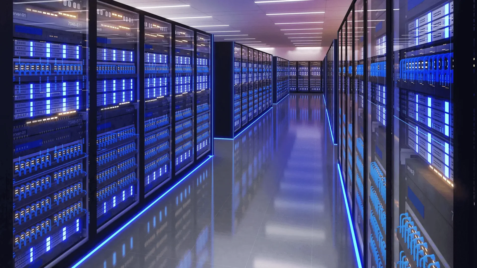A long hallway with many racks of computer equipment.